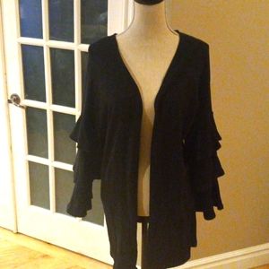 Medium long black shrug.